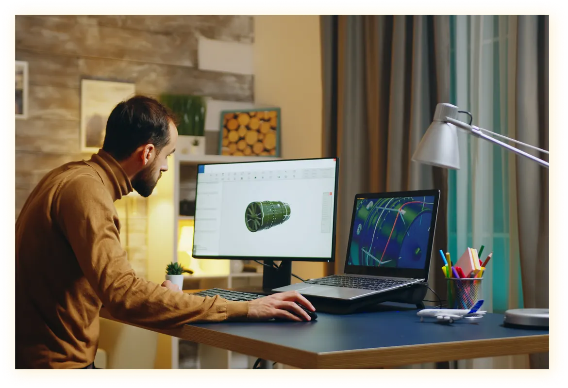 Product engineer working on a 3D mechanical design at a workstation